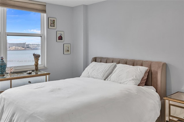 bedroom with a water view