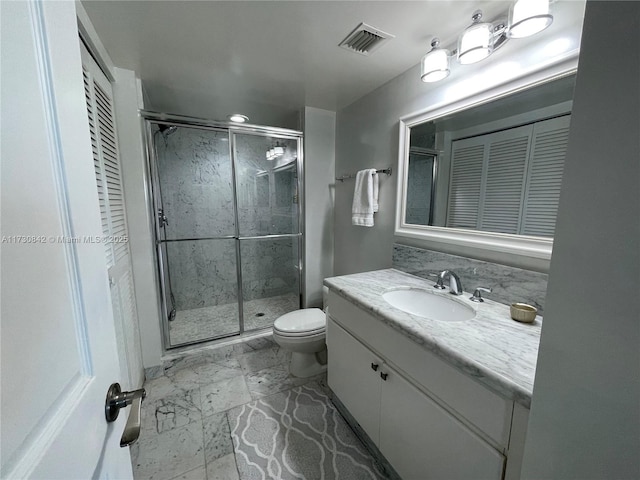 full bath featuring visible vents, a shower stall, toilet, marble finish floor, and vanity