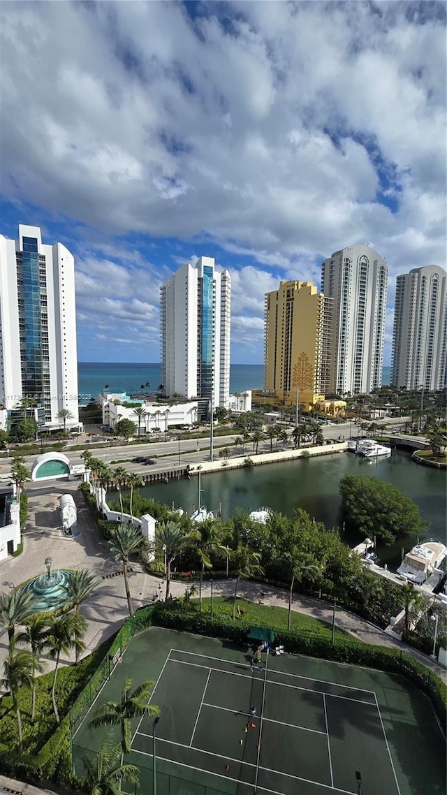 birds eye view of property featuring a water view