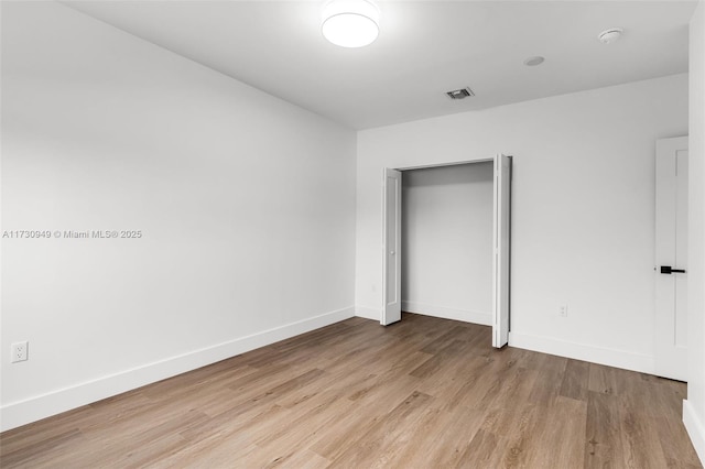 unfurnished bedroom with light hardwood / wood-style floors