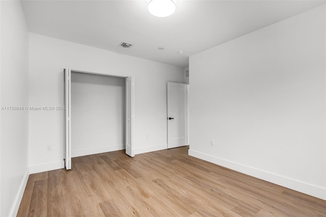 unfurnished bedroom featuring light hardwood / wood-style floors