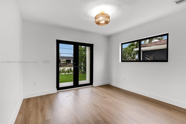 empty room featuring light hardwood / wood-style flooring