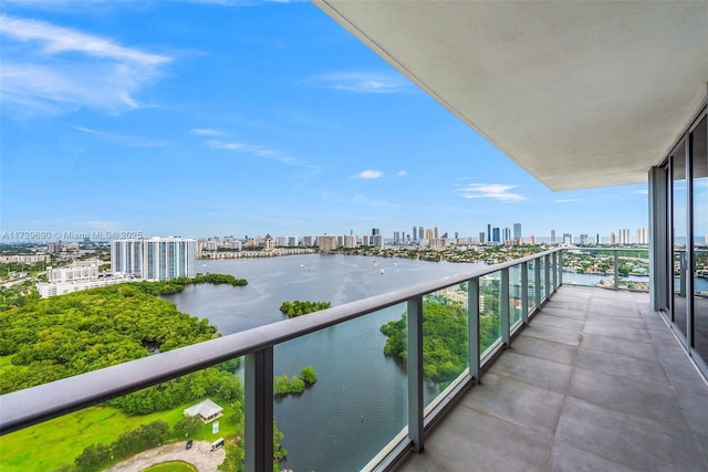 balcony featuring a water view