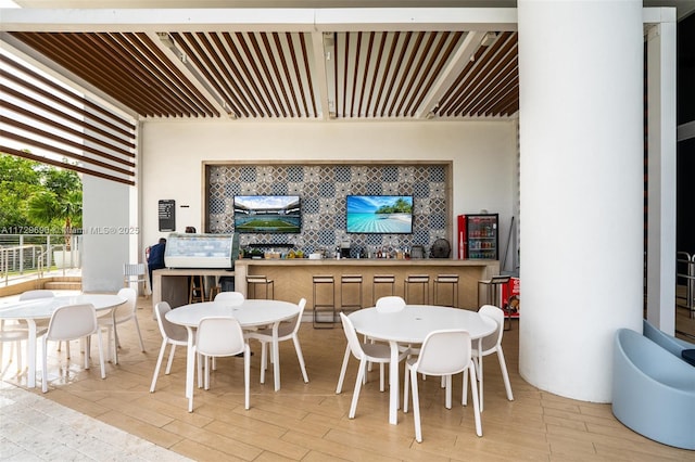 view of patio featuring an outdoor bar