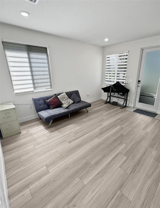 unfurnished room featuring light wood-type flooring