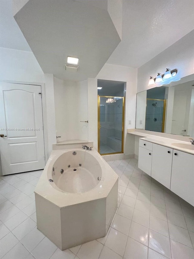 bathroom featuring separate shower and tub, tile patterned flooring, and vanity