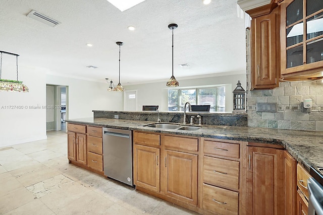 kitchen featuring sink, pendant lighting, dishwasher, and ornamental molding