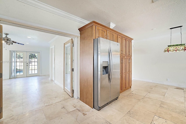 kitchen with crown molding, stainless steel refrigerator with ice dispenser, ceiling fan, french doors, and a textured ceiling