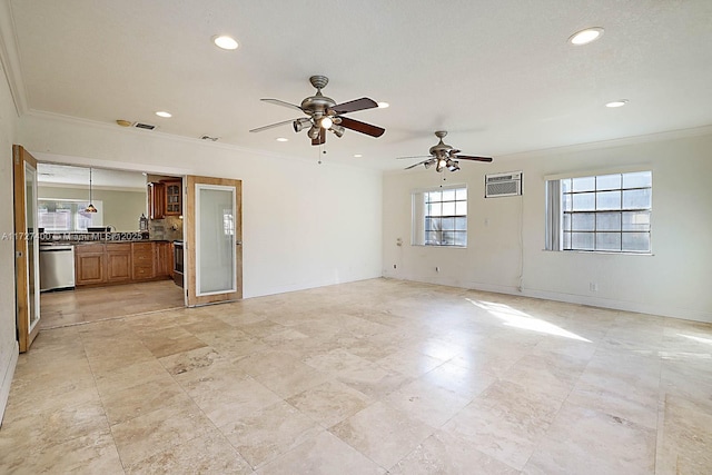 unfurnished living room with ceiling fan, an AC wall unit, and crown molding