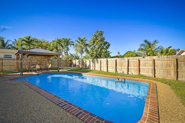 view of swimming pool featuring a gazebo