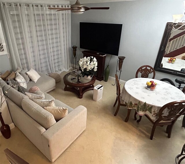 living room featuring ceiling fan