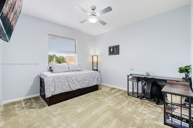 bedroom featuring ceiling fan and carpet floors