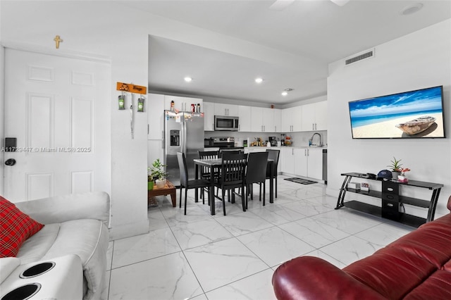 living room featuring sink