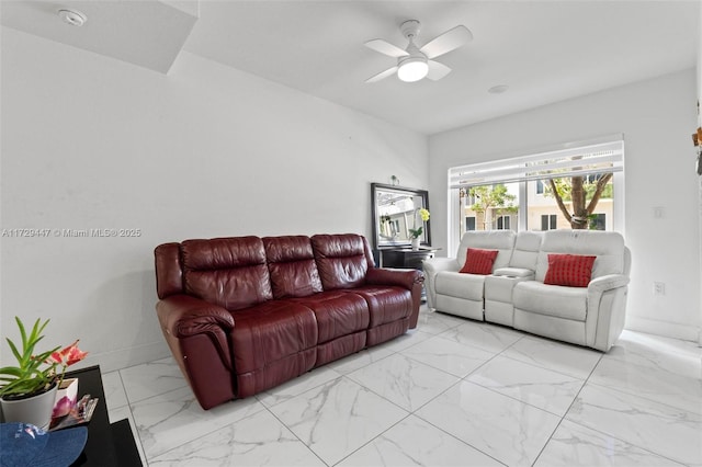 living room featuring ceiling fan