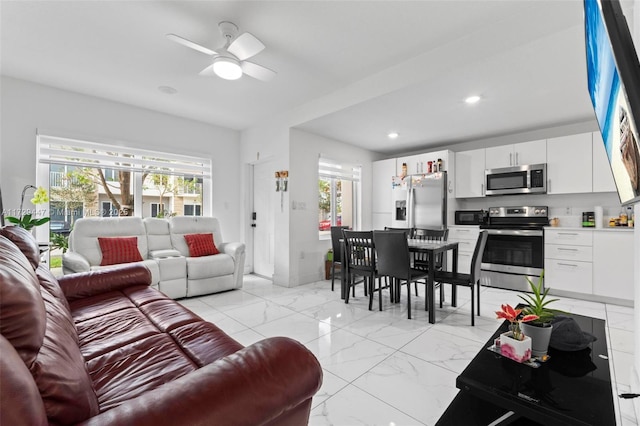 living room with ceiling fan