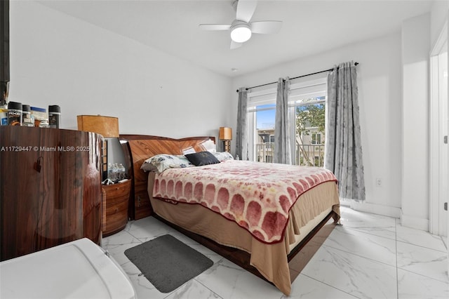 bedroom featuring ceiling fan and access to exterior