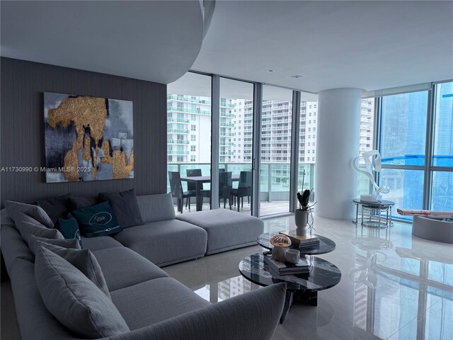 1331 Brickell Bay Dr Unit 1602, Miami, FL 33131 - living area featuring healthy amount of natural light and a wall of windows