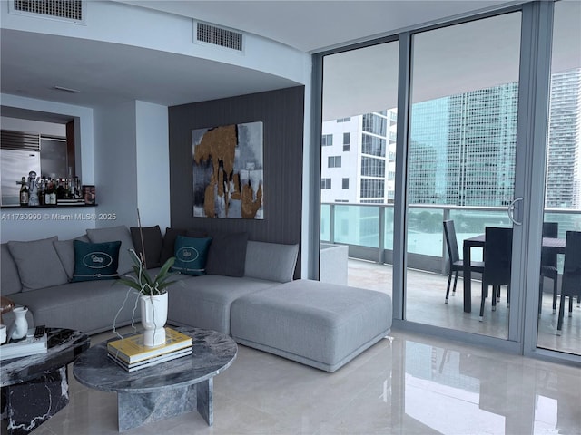 1331 Brickell Bay Dr Unit 1602, Miami, FL 33131 - living area with expansive windows and tile patterned floors