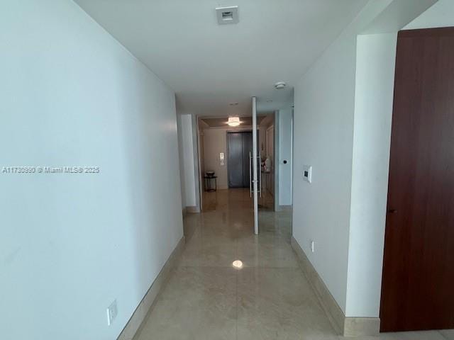 1331 Brickell Bay Dr Unit 1602, Miami, FL 33131 - hallway with baseboards