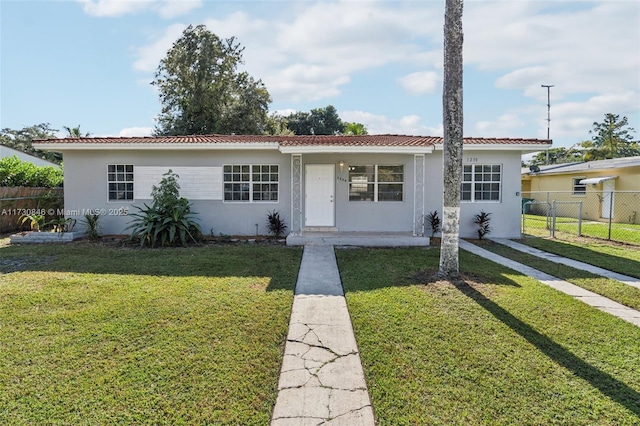 view of front of home with a front yard