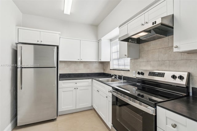 kitchen with white cabinetry, stainless steel appliances, sink, backsplash, and light tile patterned flooring