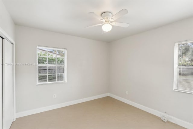 unfurnished bedroom with a closet and ceiling fan