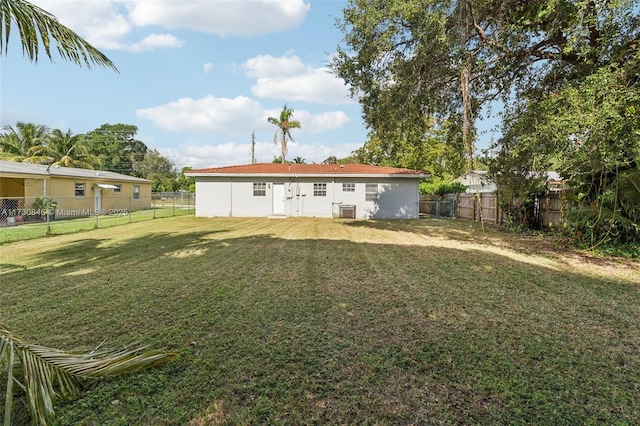 view of yard with central AC unit