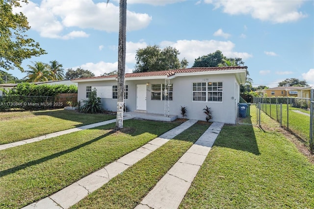 view of front of home with a front lawn