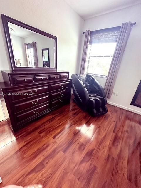 sitting room featuring hardwood / wood-style floors