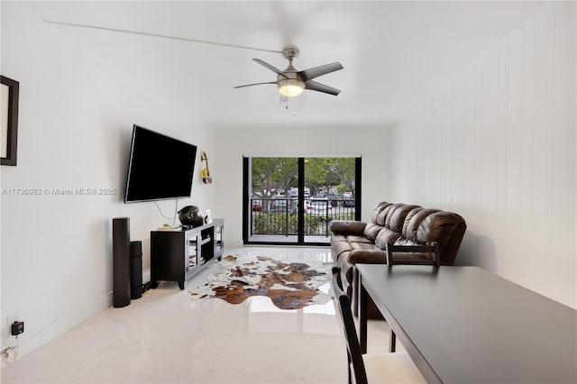 living room featuring ceiling fan