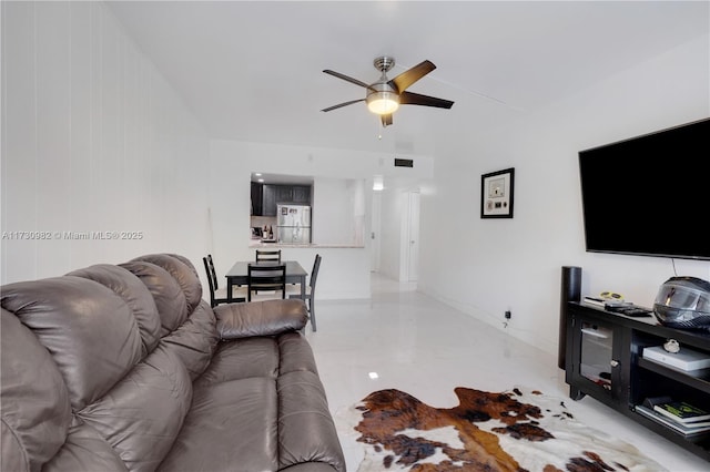 living room featuring ceiling fan