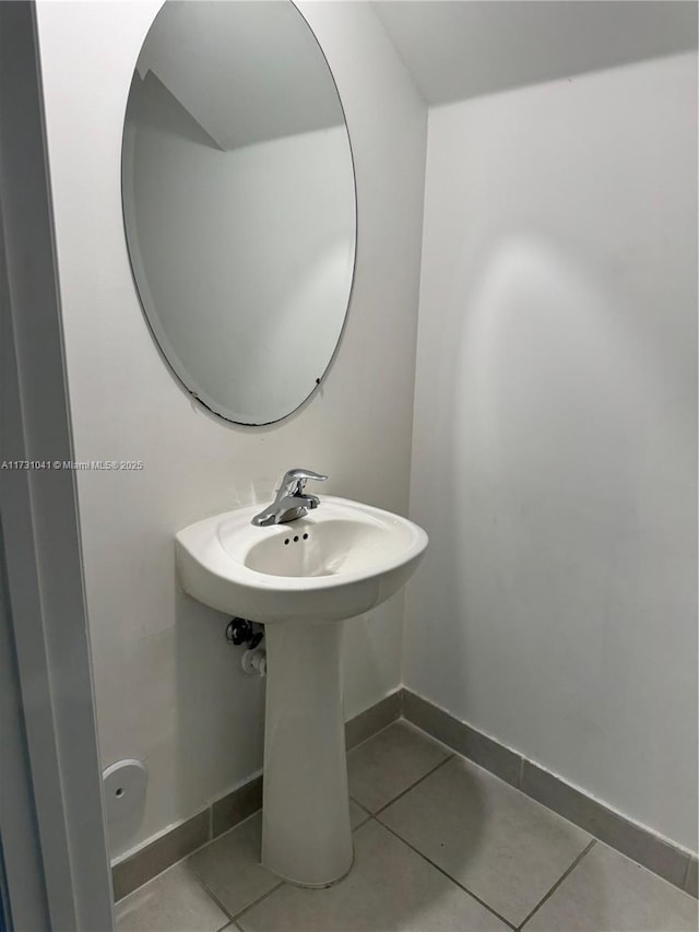 bathroom with tile patterned flooring