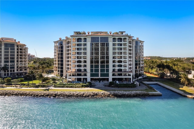 view of building exterior featuring a water view