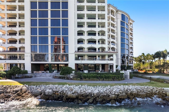 view of building exterior featuring a water view