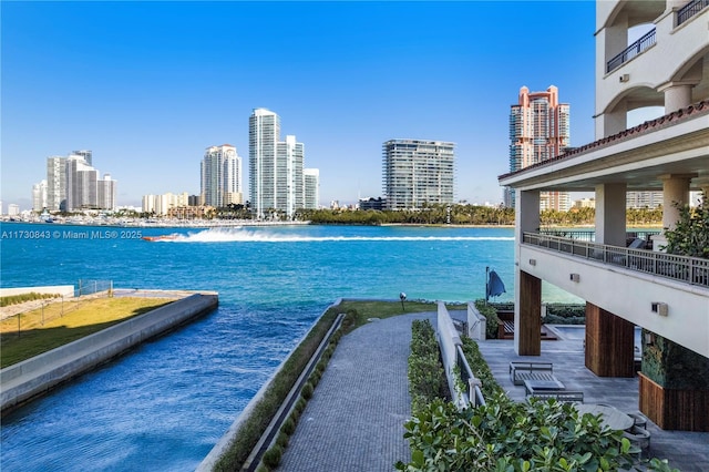 view of pool with a water view