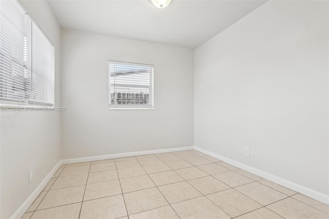 view of tiled spare room