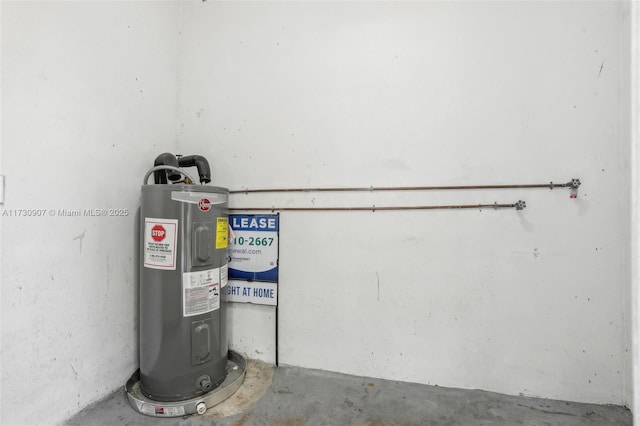 utility room with electric water heater