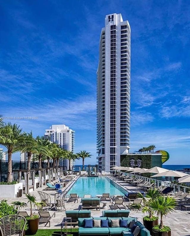 view of swimming pool with a patio