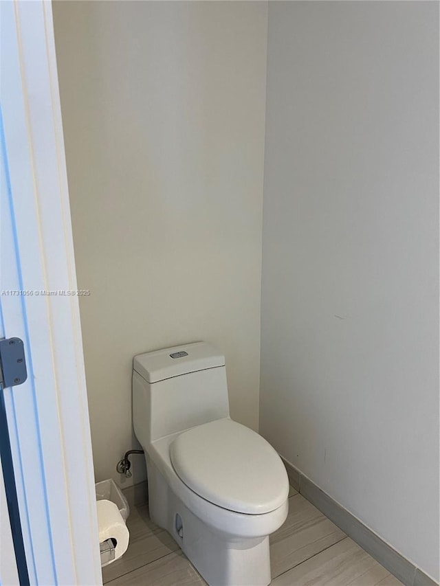 bathroom featuring toilet