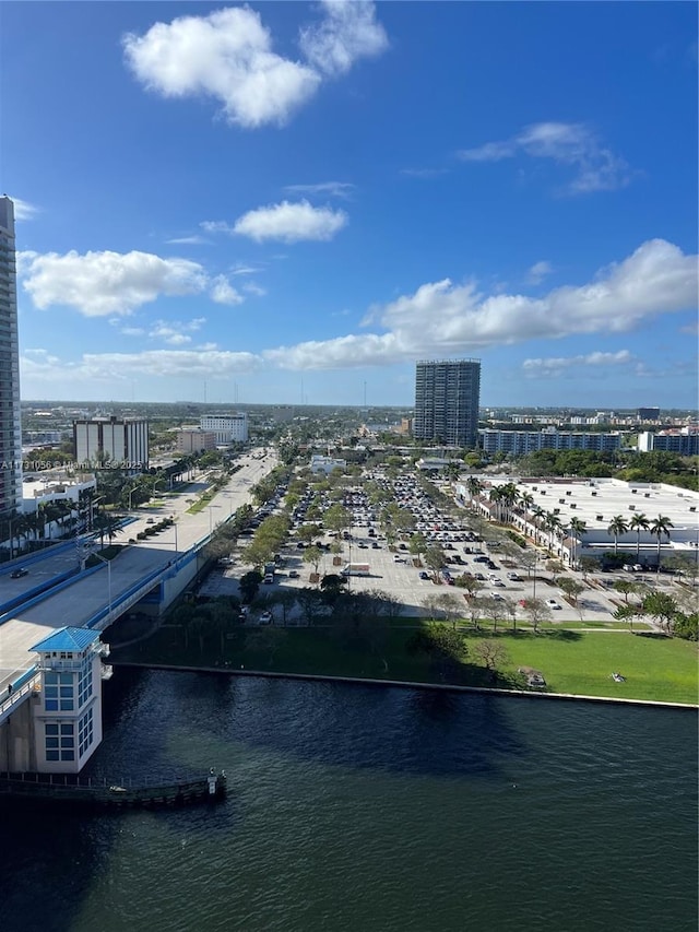 birds eye view of property featuring a water view