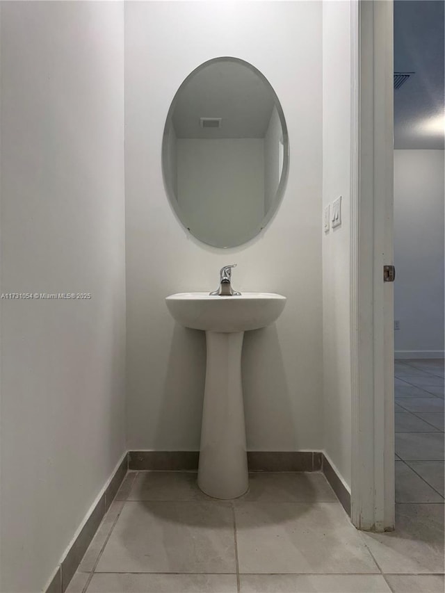 bathroom featuring tile patterned flooring