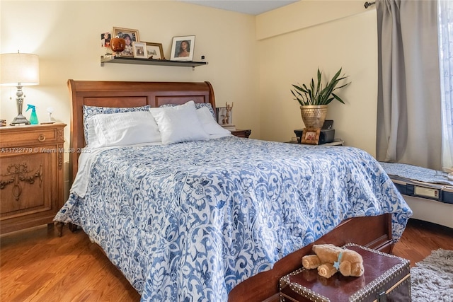 bedroom featuring hardwood / wood-style flooring