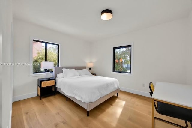 bedroom featuring light wood-type flooring