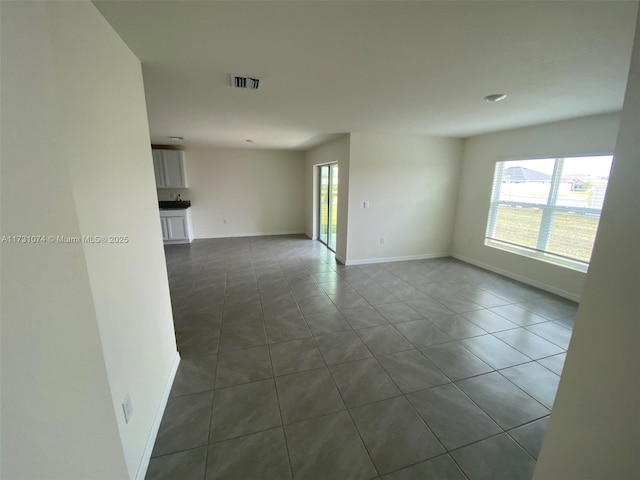 view of tiled empty room