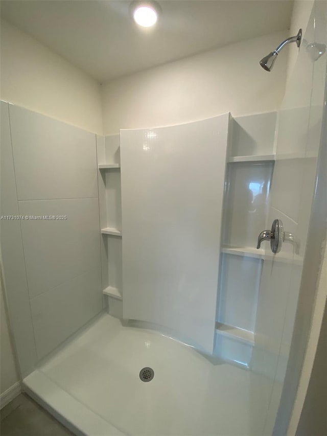 bathroom with a shower