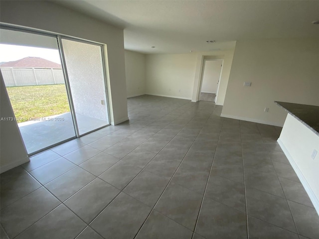 view of tiled spare room