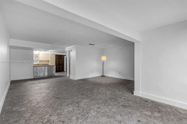 unfurnished living room with ornamental molding