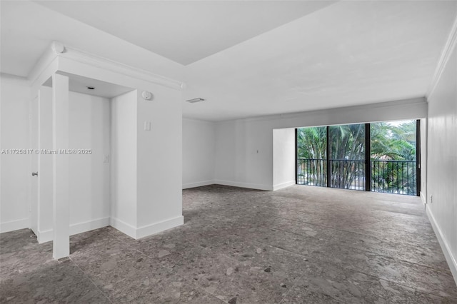 spare room with ornamental molding