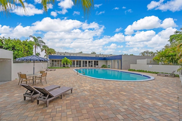 view of pool featuring a patio area