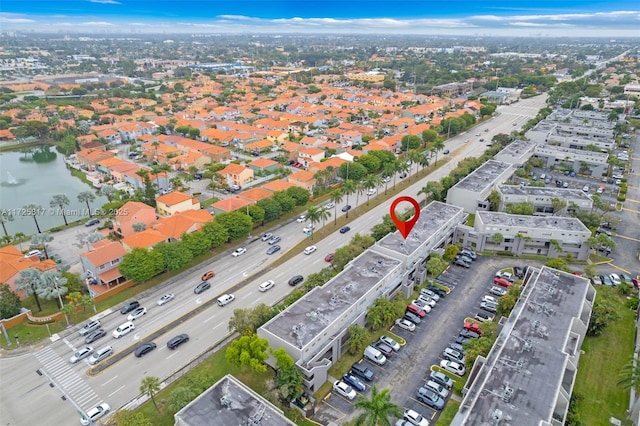 drone / aerial view featuring a water view